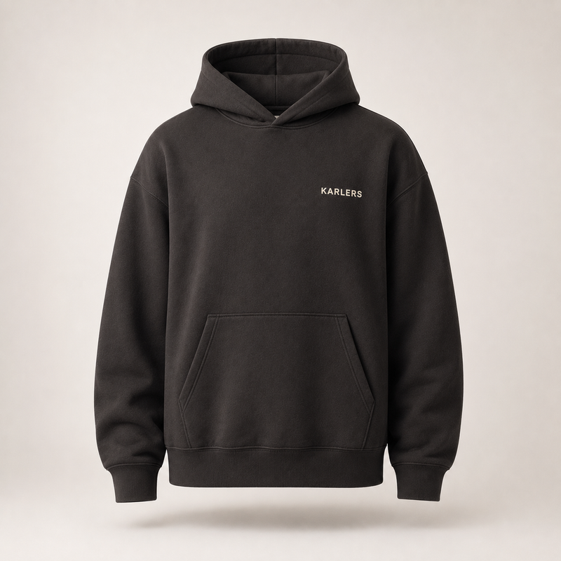 Oversized KARLERS Essential Hoodie in ink, front view with bone embroidered chest wordmark