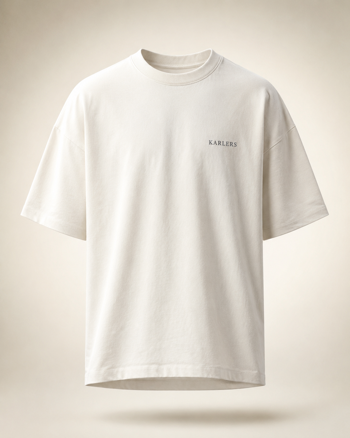 Oversized KARLERS Essential Tee in bone, front view with embroidered chest wordmark