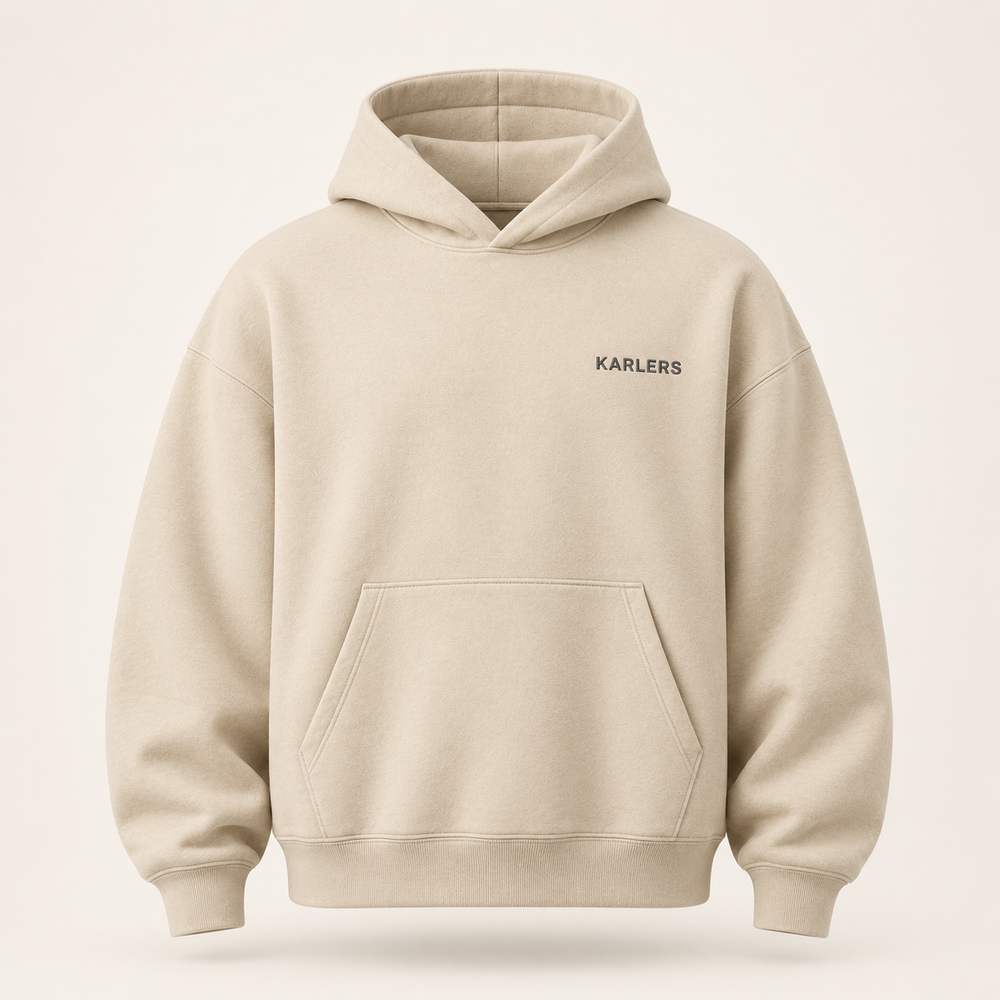 Oversized KARLERS Essential Hoodie in oat, front view with embroidered chest wordmark