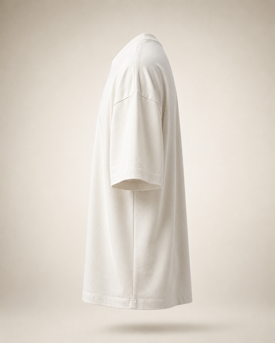KARLERS Essential Tee in bone, side profile showing the dropped shoulder seam